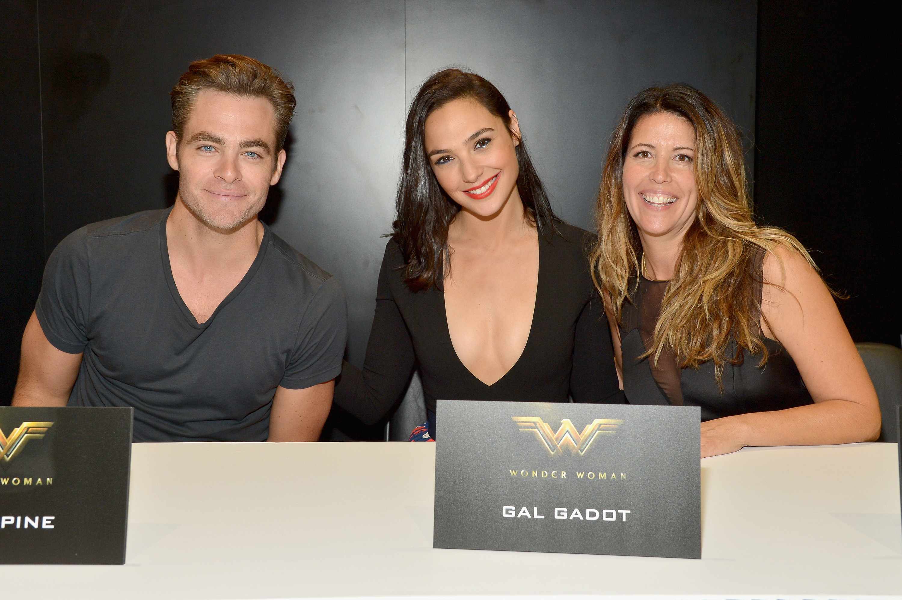 SAN DIEGO, CA - JULY 23: (L-R) Actors Chris Pine, Gal Dagot and director Patty Jenkins from the 2017 feature film Wonder Woman attend a cast signing autograph session for fans in DC's 2016 San Diego Comic-Con booth at San Diego Convention Center on July 23, 2016 in San Diego, California. (Photo by Charley Gallay/Getty Images for DC Entertainment) *** Local Caption *** Patty Jenkins;Chris Pine;Gal Dagot